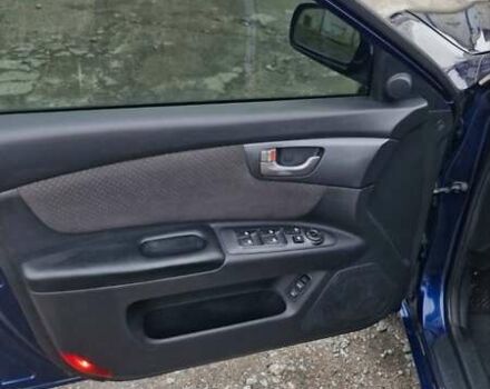 Синій Кіа Маджентіс, об'ємом двигуна 2 л та пробігом 110 тис. км за 5700 $, фото 9 на Automoto.ua