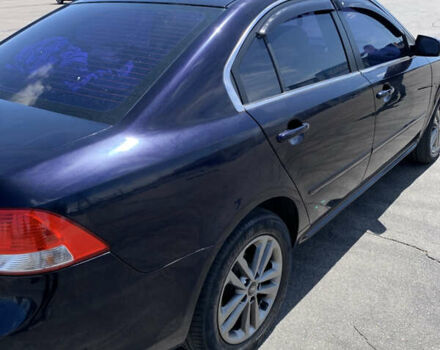 Синій Кіа Маджентіс, об'ємом двигуна 2 л та пробігом 203 тис. км за 6300 $, фото 3 на Automoto.ua