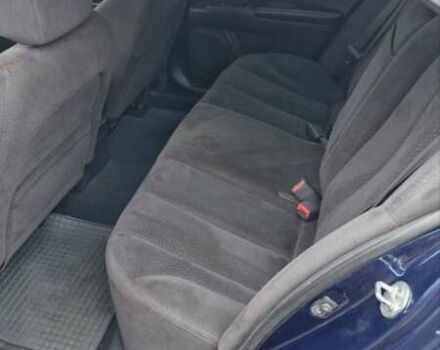 Синій Кіа Маджентіс, об'ємом двигуна 2 л та пробігом 110 тис. км за 5700 $, фото 8 на Automoto.ua