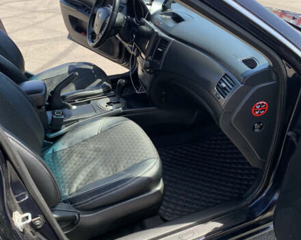 Синій Кіа Маджентіс, об'ємом двигуна 2 л та пробігом 203 тис. км за 6300 $, фото 21 на Automoto.ua