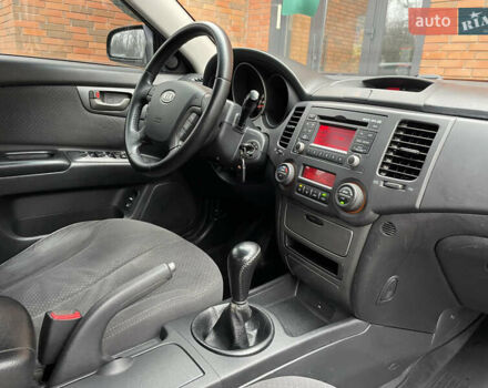 Синий Киа Маджентис, объемом двигателя 2 л и пробегом 295 тыс. км за 6200 $, фото 16 на Automoto.ua