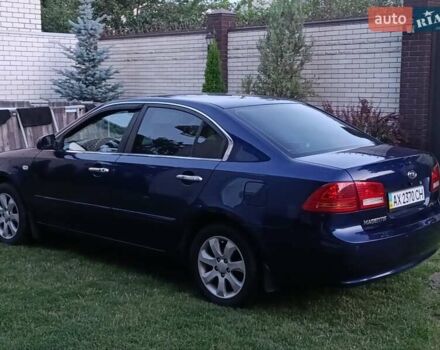 Синій Кіа Маджентіс, об'ємом двигуна 2 л та пробігом 262 тис. км за 4700 $, фото 1 на Automoto.ua