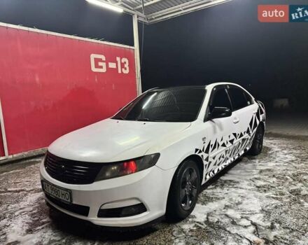 Синій Кіа Маджентіс, об'ємом двигуна 2 л та пробігом 240 тис. км за 5999 $, фото 1 на Automoto.ua
