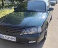 Зеленый Киа Маджентис, объемом двигателя 2 л и пробегом 376 тыс. км за 2200 $, фото 9 на Automoto.ua