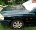 Зелений Кіа Маджентіс, об'ємом двигуна 2 л та пробігом 350 тис. км за 2200 $, фото 5 на Automoto.ua