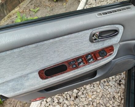 Зелений Кіа Маджентіс, об'ємом двигуна 2 л та пробігом 274 тис. км за 3800 $, фото 4 на Automoto.ua