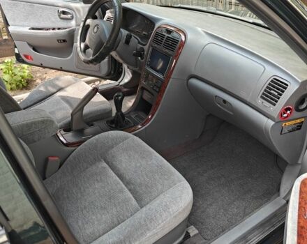 Зелений Кіа Маджентіс, об'ємом двигуна 2 л та пробігом 274 тис. км за 3800 $, фото 6 на Automoto.ua