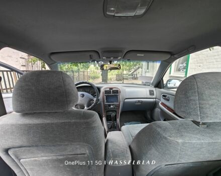 Зелений Кіа Маджентіс, об'ємом двигуна 2 л та пробігом 274 тис. км за 3800 $, фото 5 на Automoto.ua