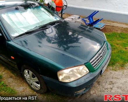 Зеленый Киа Маджентис, объемом двигателя 2 л и пробегом 350 тыс. км за 2200 $, фото 1 на Automoto.ua