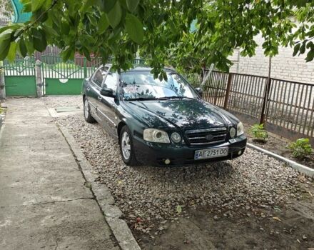 Зелений Кіа Маджентіс, об'ємом двигуна 2 л та пробігом 274 тис. км за 3800 $, фото 1 на Automoto.ua