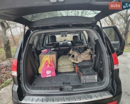 Чорний Кіа Мохаве, об'ємом двигуна 3.78 л та пробігом 296 тис. км за 13700 $, фото 8 на Automoto.ua