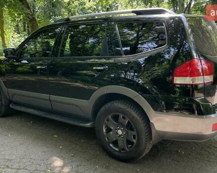 Черный Киа Мохаве, объемом двигателя 2.96 л и пробегом 315 тыс. км за 12500 $, фото 6 на Automoto.ua