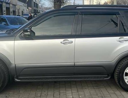 Серый Киа Мохаве, объемом двигателя 3.78 л и пробегом 118 тыс. км за 14000 $, фото 3 на Automoto.ua