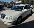 Белый Киа Опирус, объемом двигателя 3 л и пробегом 224 тыс. км за 3317 $, фото 1 на Automoto.ua