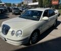 Белый Киа Опирус, объемом двигателя 2.97 л и пробегом 224 тыс. км за 3300 $, фото 1 на Automoto.ua