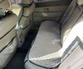 Черный Киа Опирус, объемом двигателя 3.5 л и пробегом 180 тыс. км за 5500 $, фото 4 на Automoto.ua