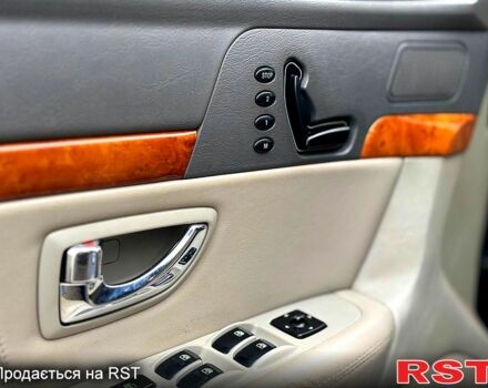 Чорний Кіа Опірус, об'ємом двигуна 3.5 л та пробігом 150 тис. км за 3900 $, фото 12 на Automoto.ua