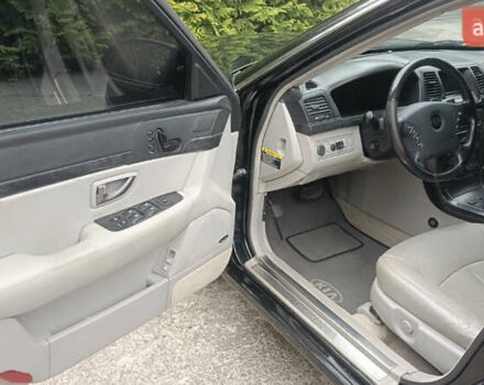 Черный Киа Опирус, объемом двигателя 3.78 л и пробегом 185 тыс. км за 6800 $, фото 10 на Automoto.ua