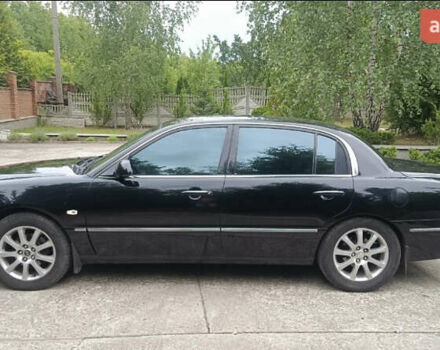 Черный Киа Опирус, объемом двигателя 3.78 л и пробегом 185 тыс. км за 6800 $, фото 7 на Automoto.ua