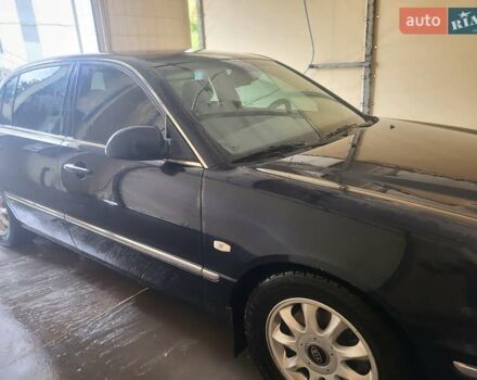 Синий Киа Опирус, объемом двигателя 3.49 л и пробегом 250 тыс. км за 5799 $, фото 3 на Automoto.ua