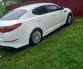 Белый Киа Оптима, объемом двигателя 2 л и пробегом 287 тыс. км за 9000 $, фото 1 на Automoto.ua