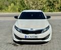Білий Кіа Оптіма, об'ємом двигуна 2 л та пробігом 262 тис. км за 7550 $, фото 1 на Automoto.ua