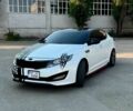Белый Киа Оптима, объемом двигателя 2 л и пробегом 285 тыс. км за 8700 $, фото 1 на Automoto.ua