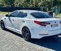 Білий Кіа Оптіма, об'ємом двигуна 2 л та пробігом 262 тис. км за 7550 $, фото 2 на Automoto.ua