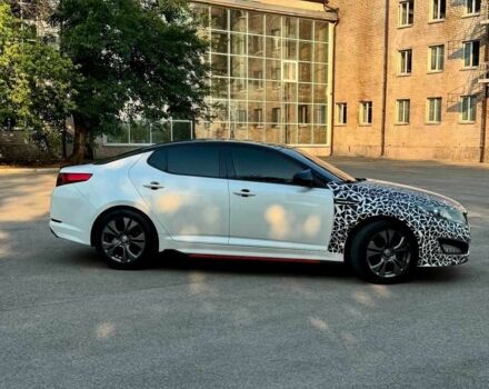 Белый Киа Оптима, объемом двигателя 2 л и пробегом 285 тыс. км за 8700 $, фото 3 на Automoto.ua