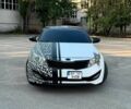 Белый Киа Оптима, объемом двигателя 2 л и пробегом 285 тыс. км за 8700 $, фото 1 на Automoto.ua