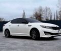 Білий Кіа Оптіма, об'ємом двигуна 2 л та пробігом 287 тис. км за 8250 $, фото 1 на Automoto.ua