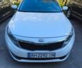 Белый Киа Оптима, объемом двигателя 2 л и пробегом 333 тыс. км за 8500 $, фото 1 на Automoto.ua