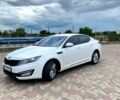 Белый Киа Оптима, объемом двигателя 2 л и пробегом 130 тыс. км за 9500 $, фото 5 на Automoto.ua