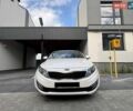 Белый Киа Оптима, объемом двигателя 2 л и пробегом 175 тыс. км за 8500 $, фото 1 на Automoto.ua