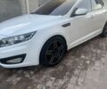 Белый Киа Оптима, объемом двигателя 2 л и пробегом 330 тыс. км за 10500 $, фото 4 на Automoto.ua