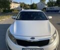 Белый Киа Оптима, объемом двигателя 2 л и пробегом 177 тыс. км за 9600 $, фото 1 на Automoto.ua