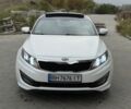 Білий Кіа Оптіма, об'ємом двигуна 2 л та пробігом 365 тис. км за 7700 $, фото 1 на Automoto.ua
