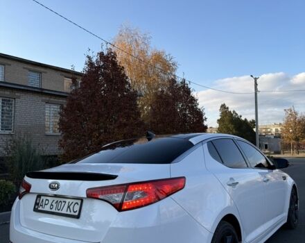 Белый Киа Оптима, объемом двигателя 2 л и пробегом 125 тыс. км за 9400 $, фото 2 на Automoto.ua