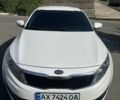 Білий Кіа Оптіма, об'ємом двигуна 2 л та пробігом 103 тис. км за 8500 $, фото 1 на Automoto.ua