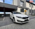 Білий Кіа Оптіма, об'ємом двигуна 2 л та пробігом 175 тис. км за 10500 $, фото 1 на Automoto.ua