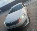 Білий Кіа Оптіма, об'ємом двигуна 2.5 л та пробігом 250 тис. км за 8500 $, фото 1 на Automoto.ua