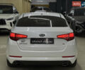 Білий Кіа Оптіма, об'ємом двигуна 2.36 л та пробігом 262 тис. км за 8199 $, фото 10 на Automoto.ua