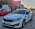 Білий Кіа Оптіма, об'ємом двигуна 2 л та пробігом 200 тис. км за 9800 $, фото 1 на Automoto.ua