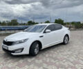 Белый Киа Оптима, объемом двигателя 2 л и пробегом 245 тыс. км за 10200 $, фото 1 на Automoto.ua