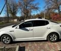 Білий Кіа Оптіма, об'ємом двигуна 2 л та пробігом 300 тис. км за 7600 $, фото 9 на Automoto.ua