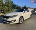 Белый Киа Оптима, объемом двигателя 2 л и пробегом 177 тыс. км за 9600 $, фото 1 на Automoto.ua