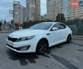 Белый Киа Оптима, объемом двигателя 2 л и пробегом 272 тыс. км за 9000 $, фото 1 на Automoto.ua