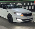 Белый Киа Оптима, объемом двигателя 2 л и пробегом 225 тыс. км за 8300 $, фото 1 на Automoto.ua