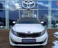 Білий Кіа Оптіма, об'ємом двигуна 2 л та пробігом 161 тис. км за 8994 $, фото 4 на Automoto.ua