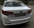 Белый Киа Оптима, объемом двигателя 2 л и пробегом 85 тыс. км за 10000 $, фото 2 на Automoto.ua